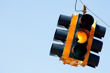 Yellow Light Timing to Prevent Drivers from Running Red Lights and Causing Accidents